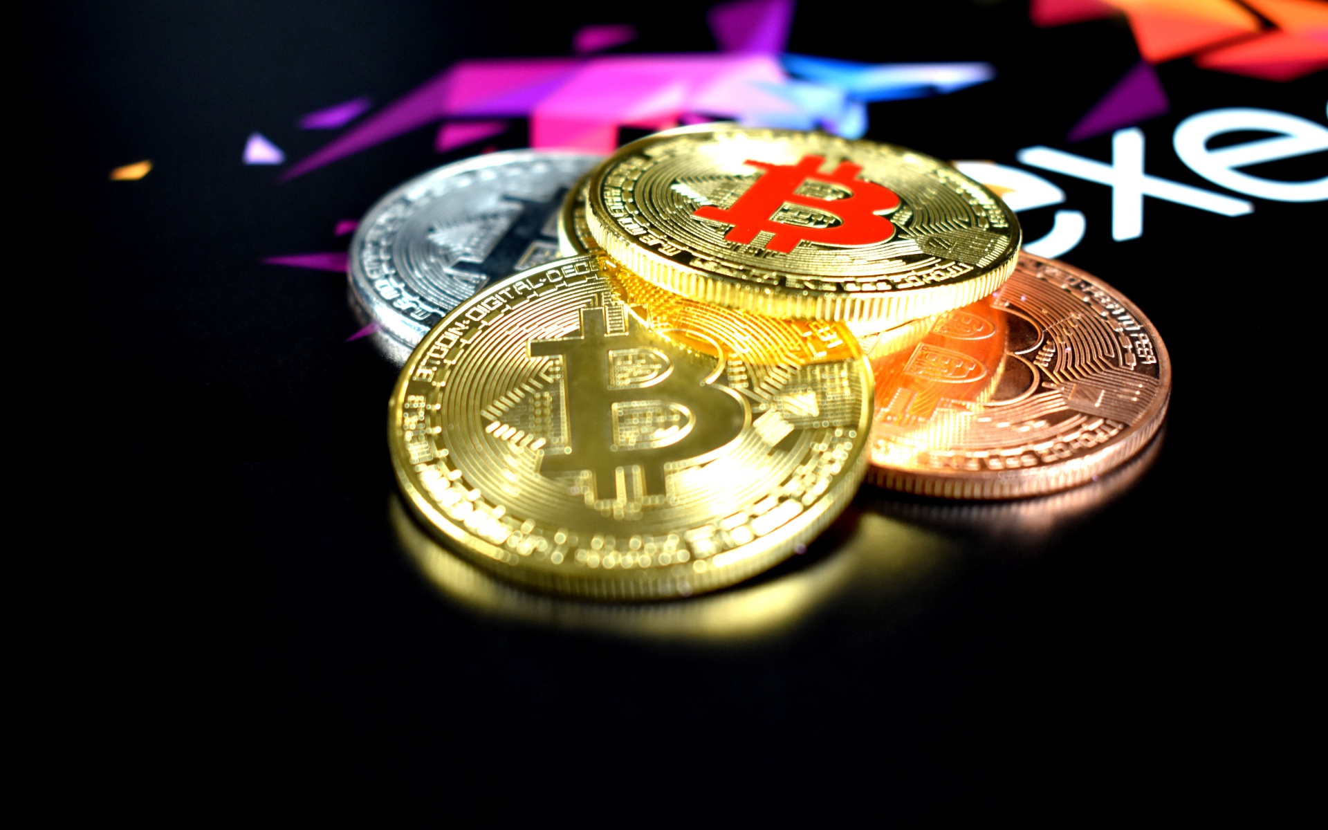 Bitcoin coins on black table