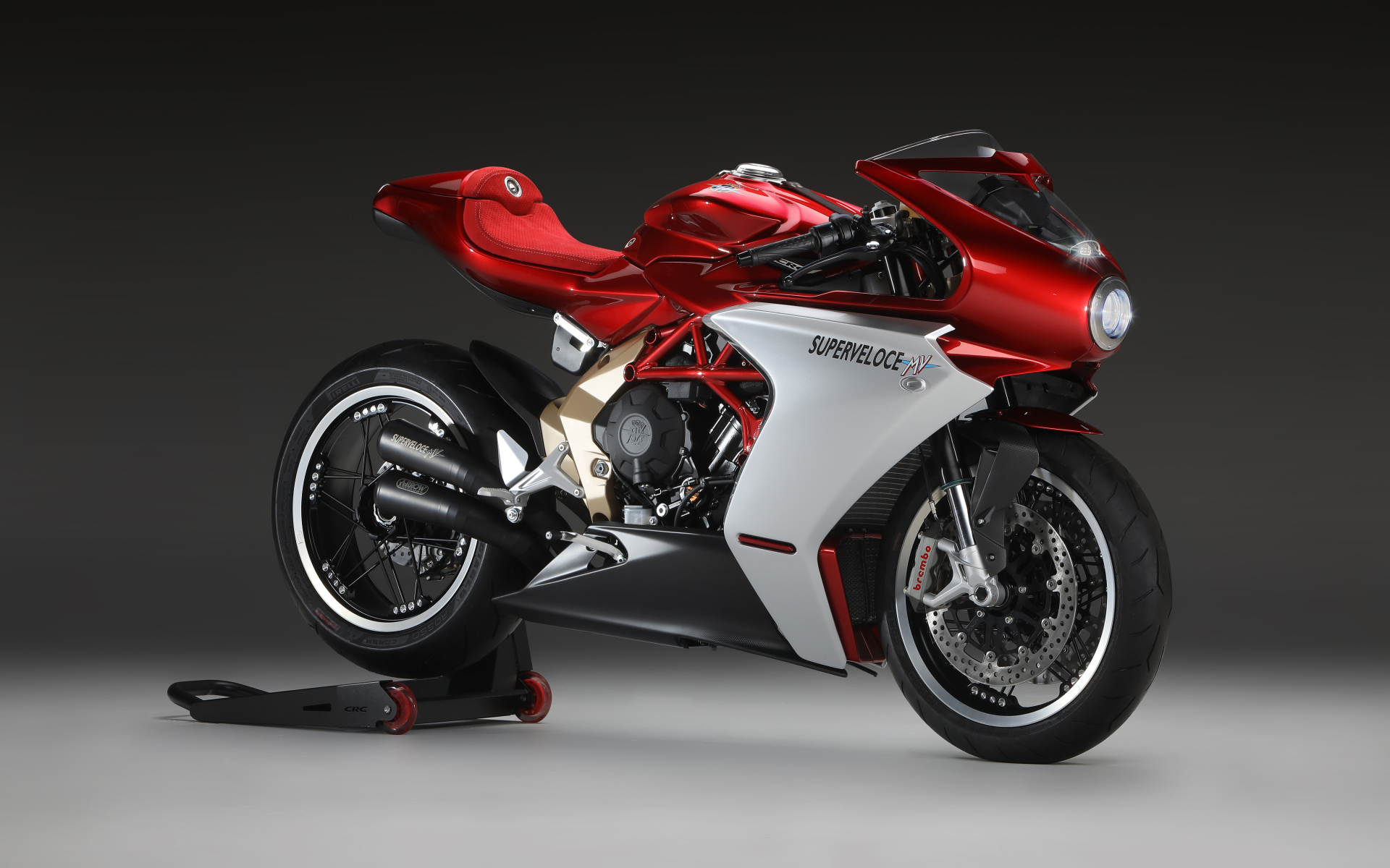 Red motorcycle Agusta Superveloce 800 Serie Oro 2020 on a gray background