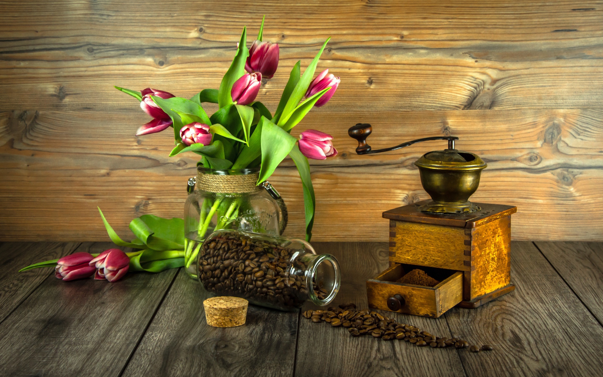 Bouquet of tulips on a table with coffee