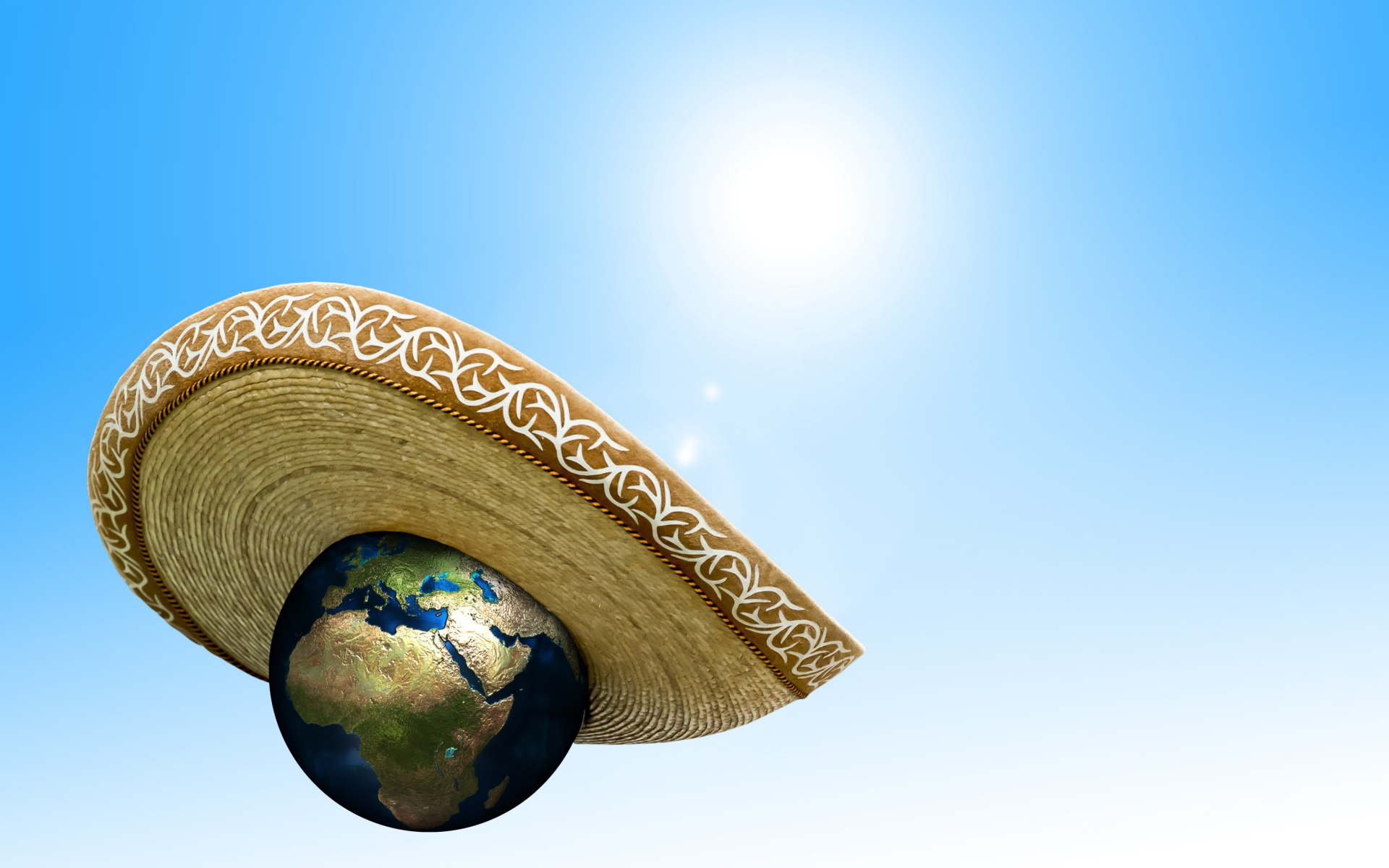 Планета земля в сомбреро на голубом фоне