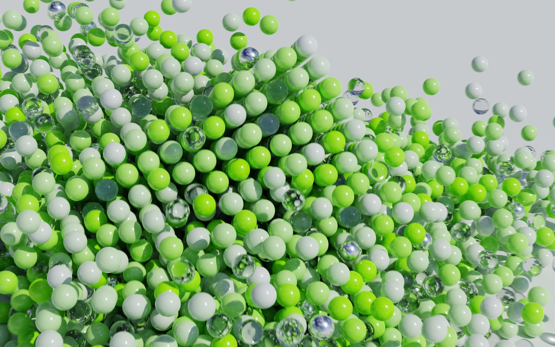 Много пластиковых и стеклянных зеленых шариков
