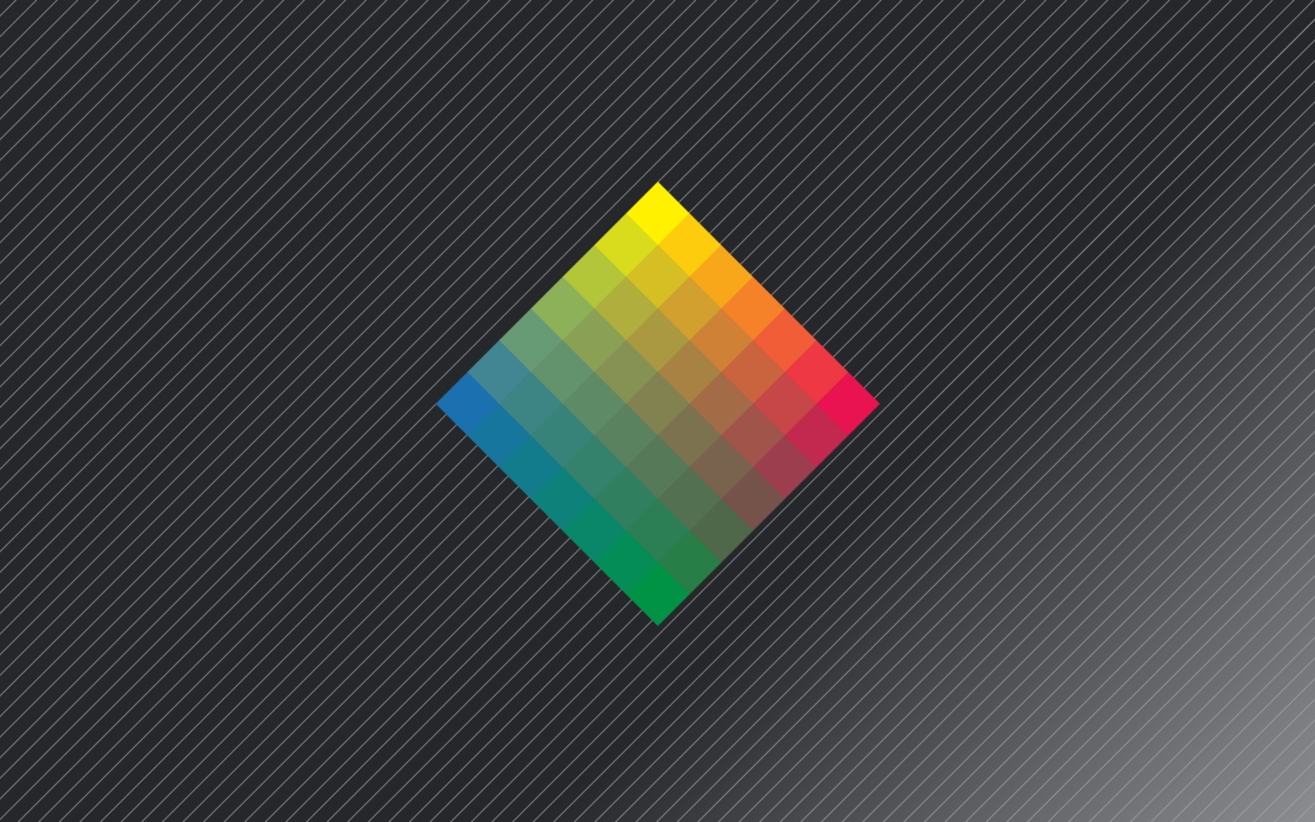 Разноцветный ромб на сером фоне