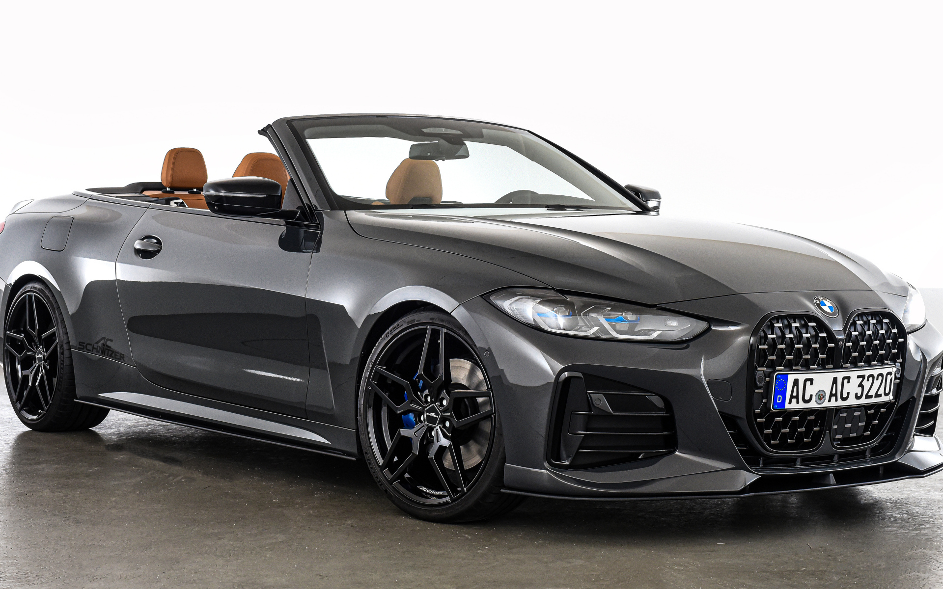 Серебристый кабриолет BMW 4 Series Cabrio 2021 года