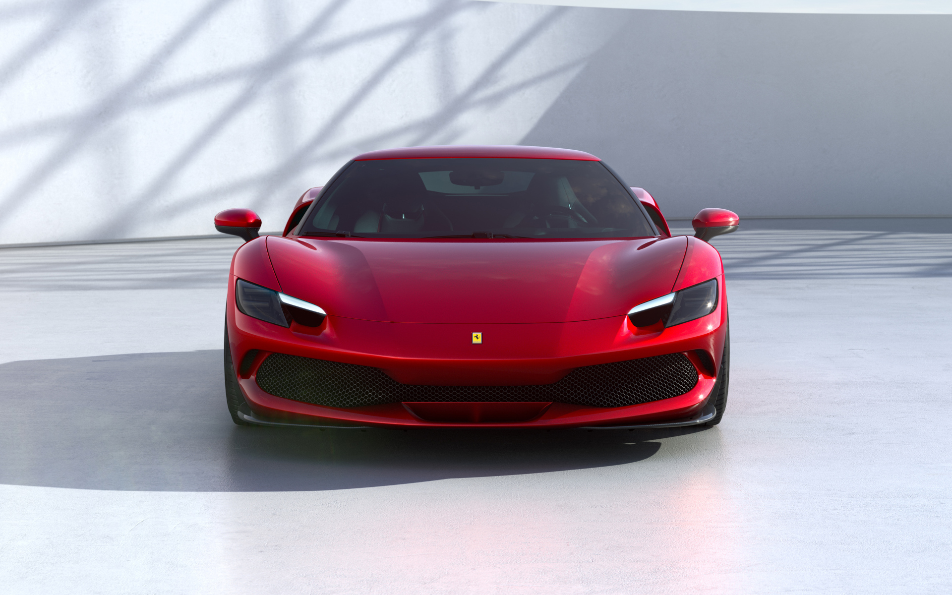 Красный Ferrari 296 GTB 2022 года вид спереди