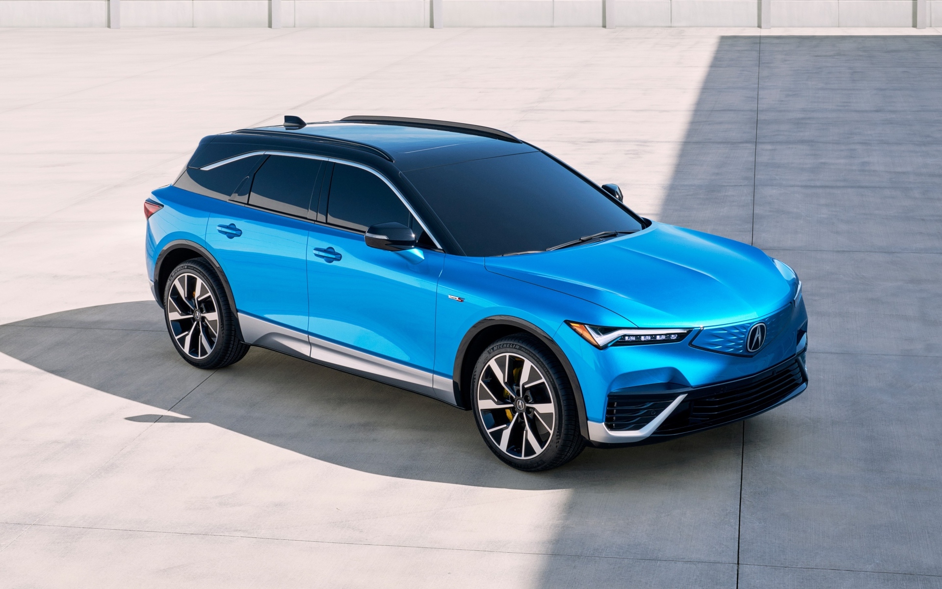 Голубой автомобиль Acura ZDX Type S 2024 года