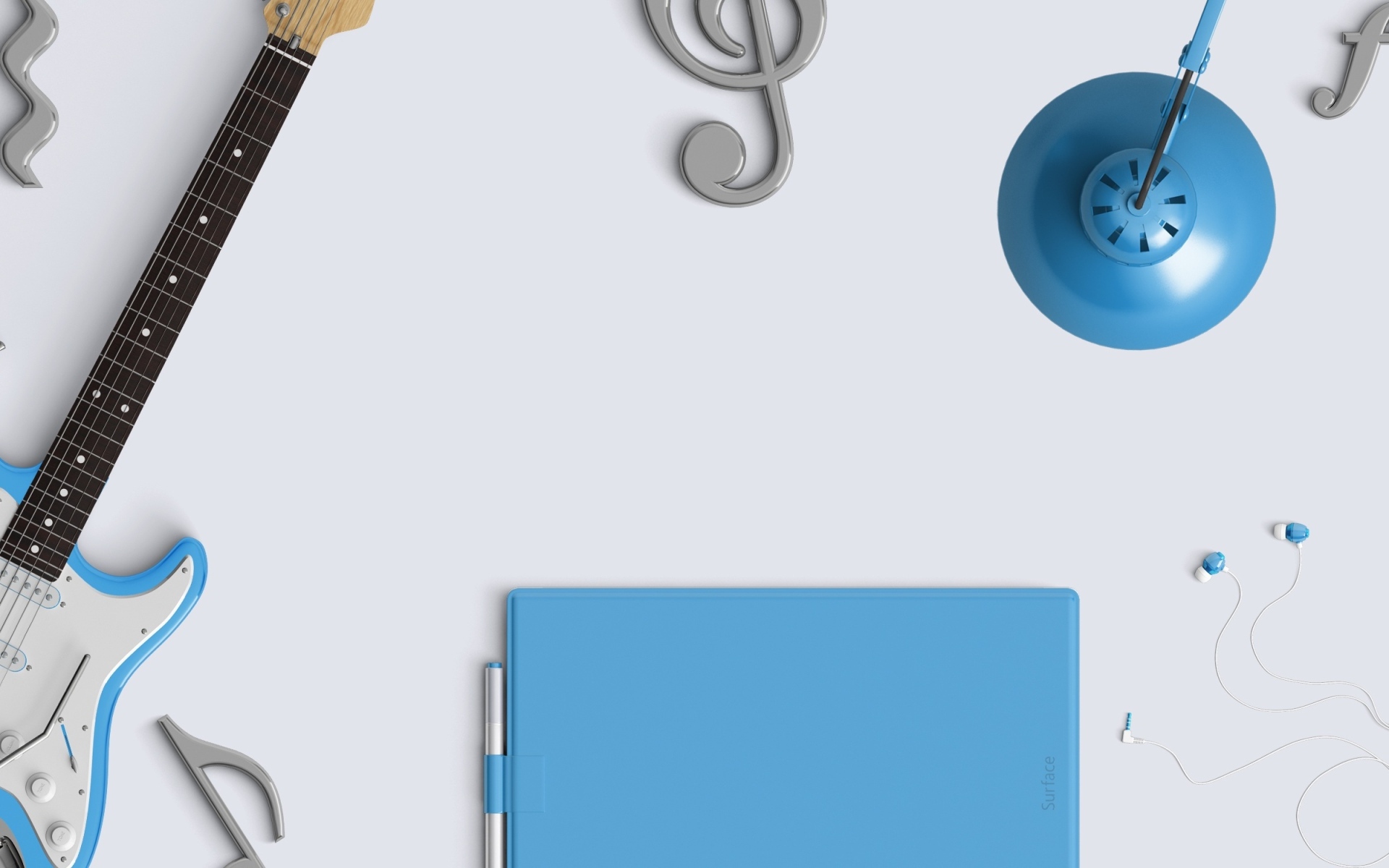 Гитара, планшет и ноты на сером фоне