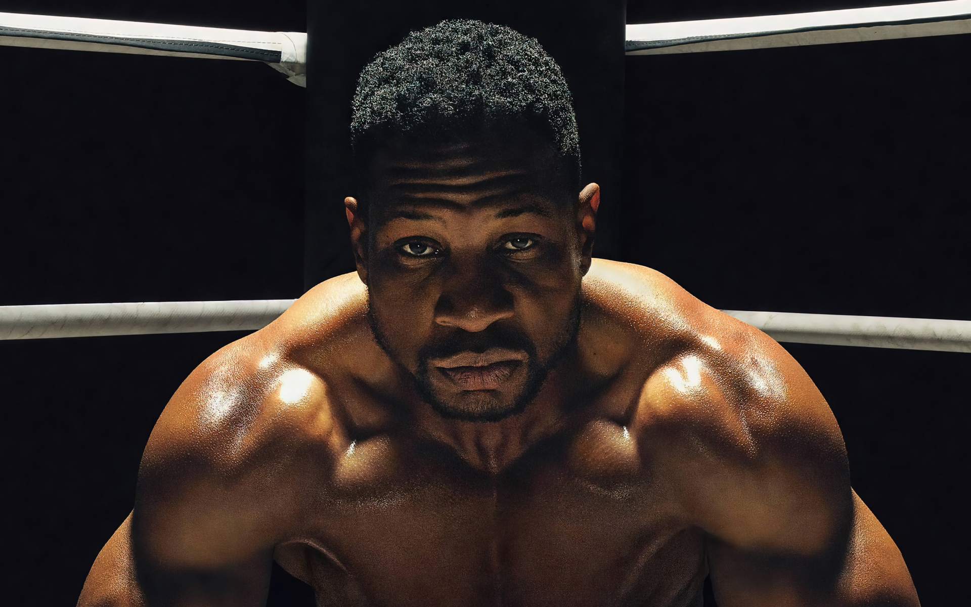 Актер Майкл Бака́ри Джо́рдан в фильме Крид 3