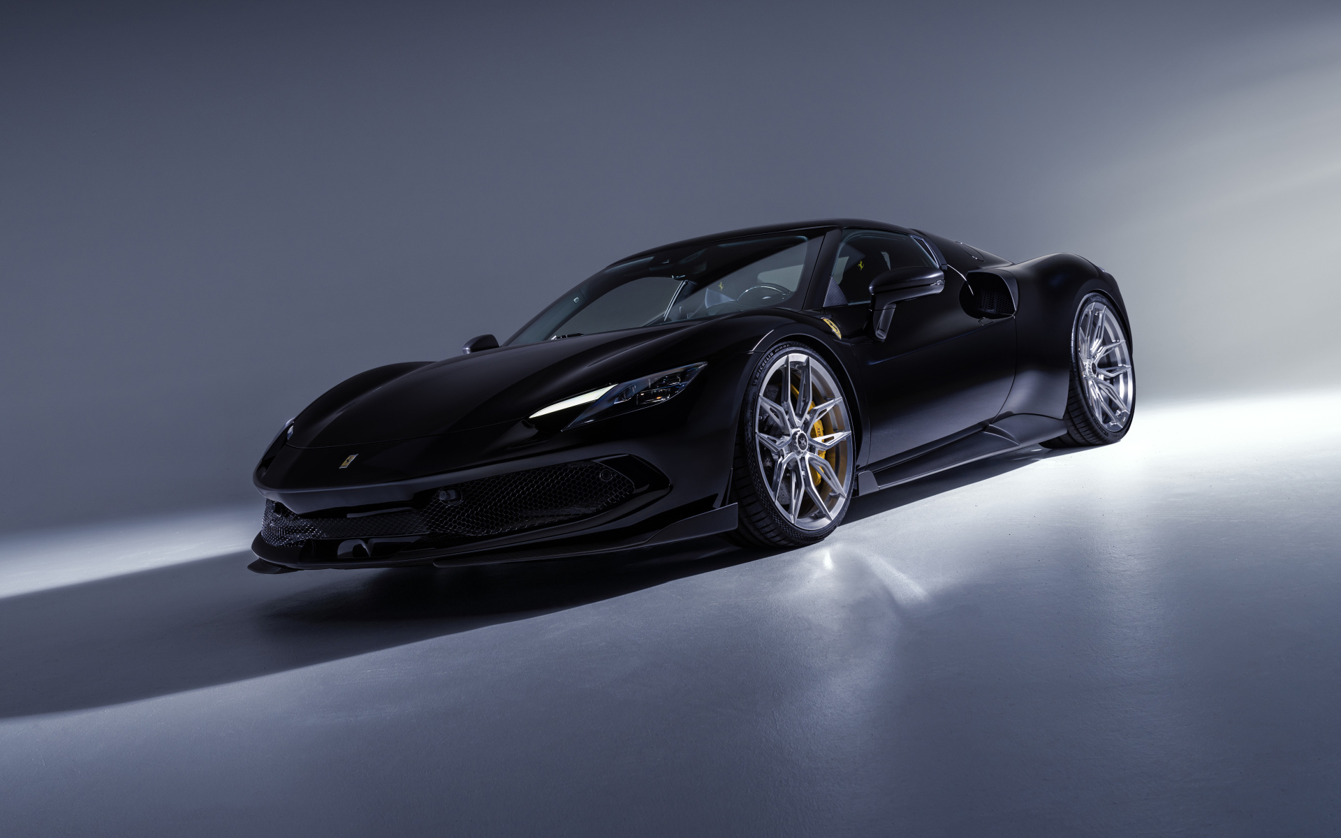 Черный быстрый автомобиль Novitec Ferrari 296 GTB Aero 2024 года