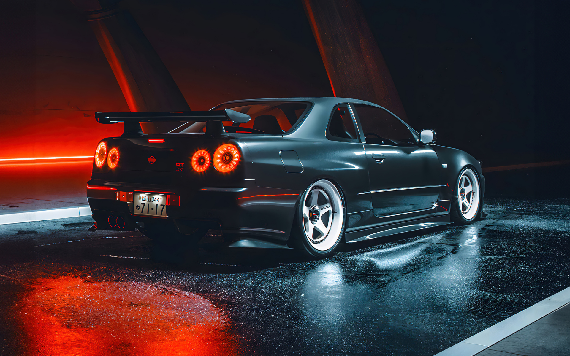 Черный автомобиль Nissan Skyline GTR R35 вид сзади