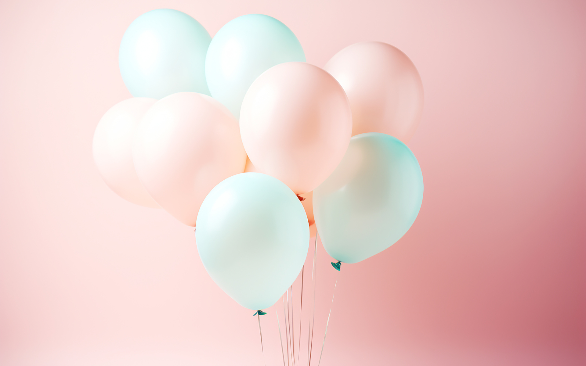 Воздушные шарики с гелием на розовом фоне