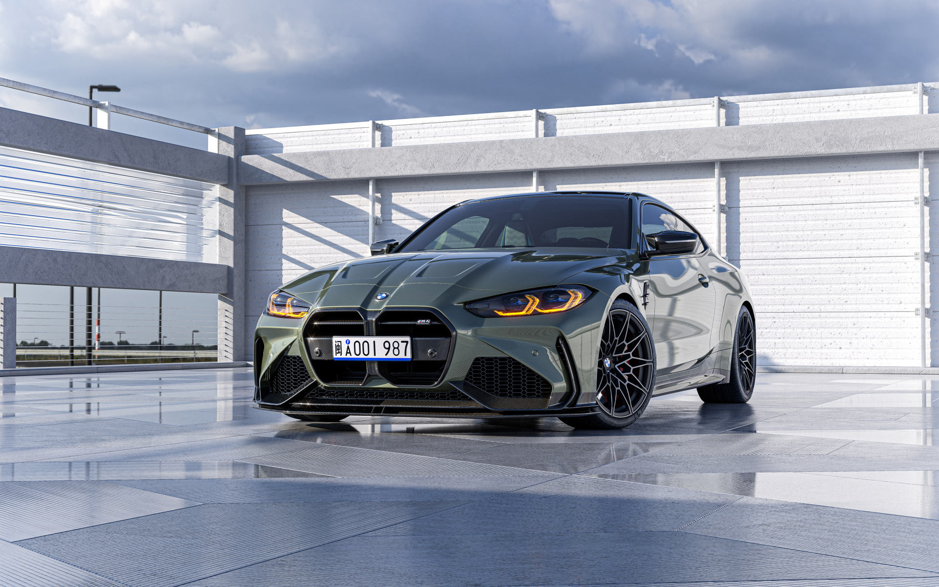 Автомобиль BMW M4 G82 на сером фоне