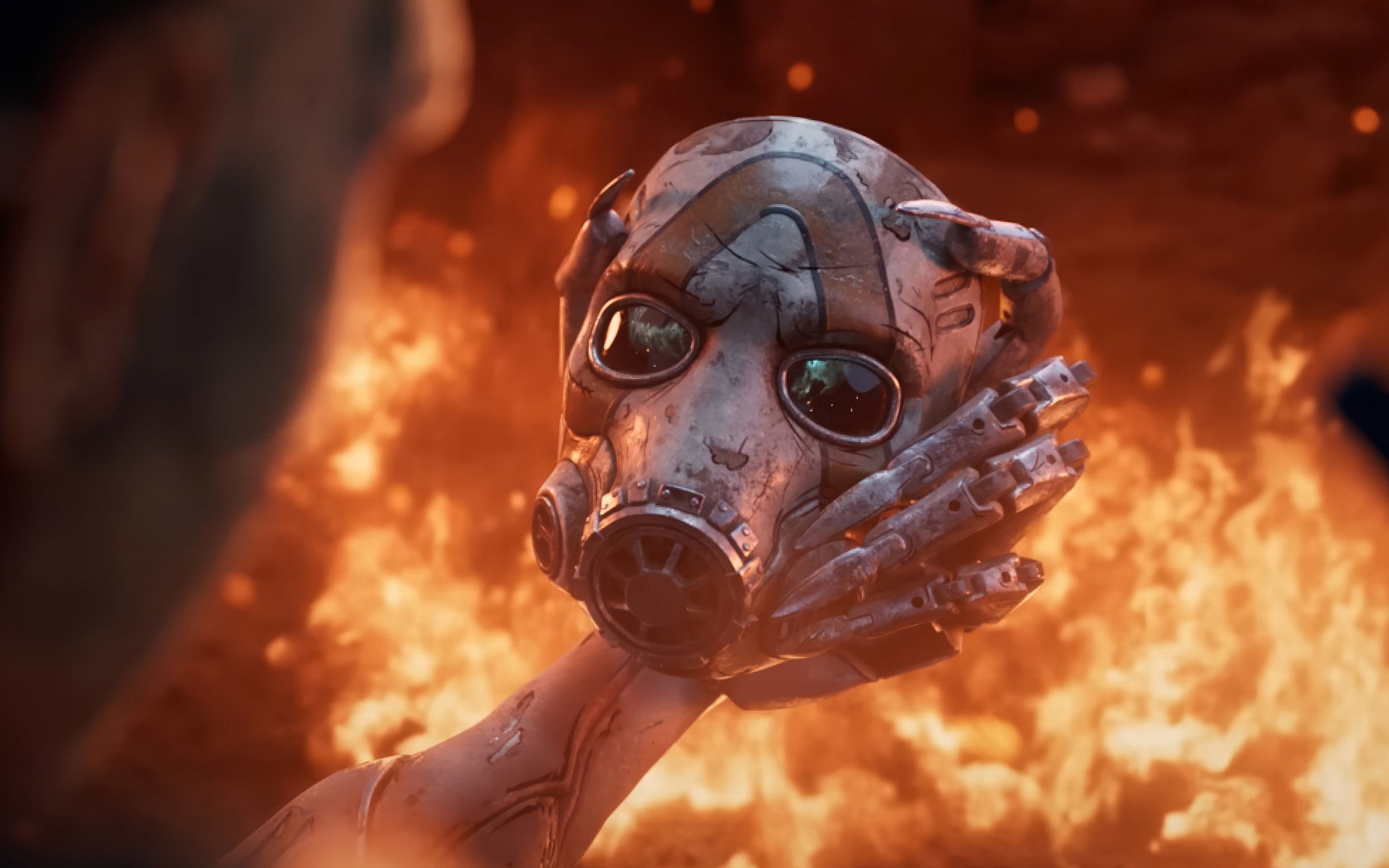 Маска в руках на фоне огня в видеоигре Borderlands 4