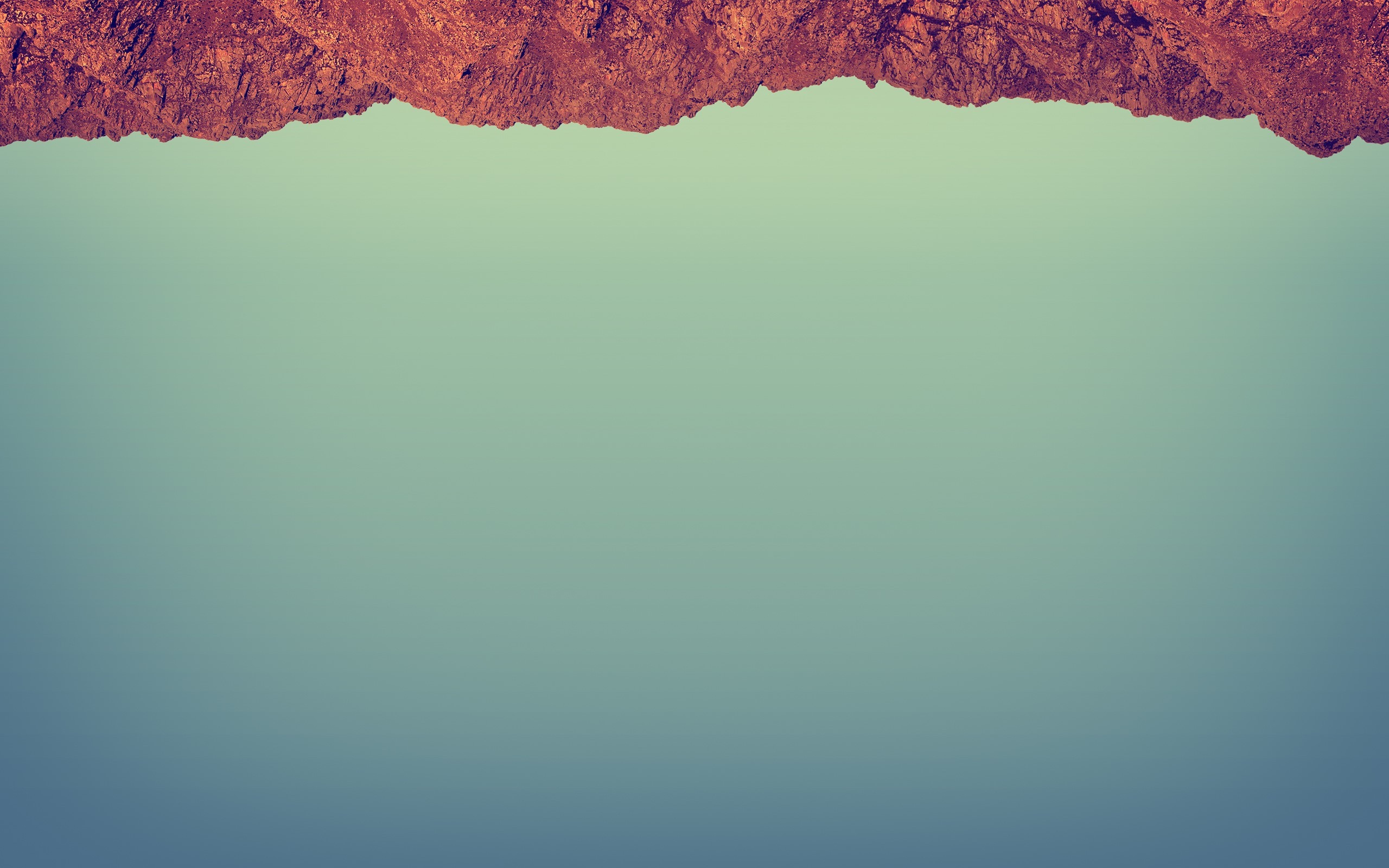 Красный камень на сером фоне