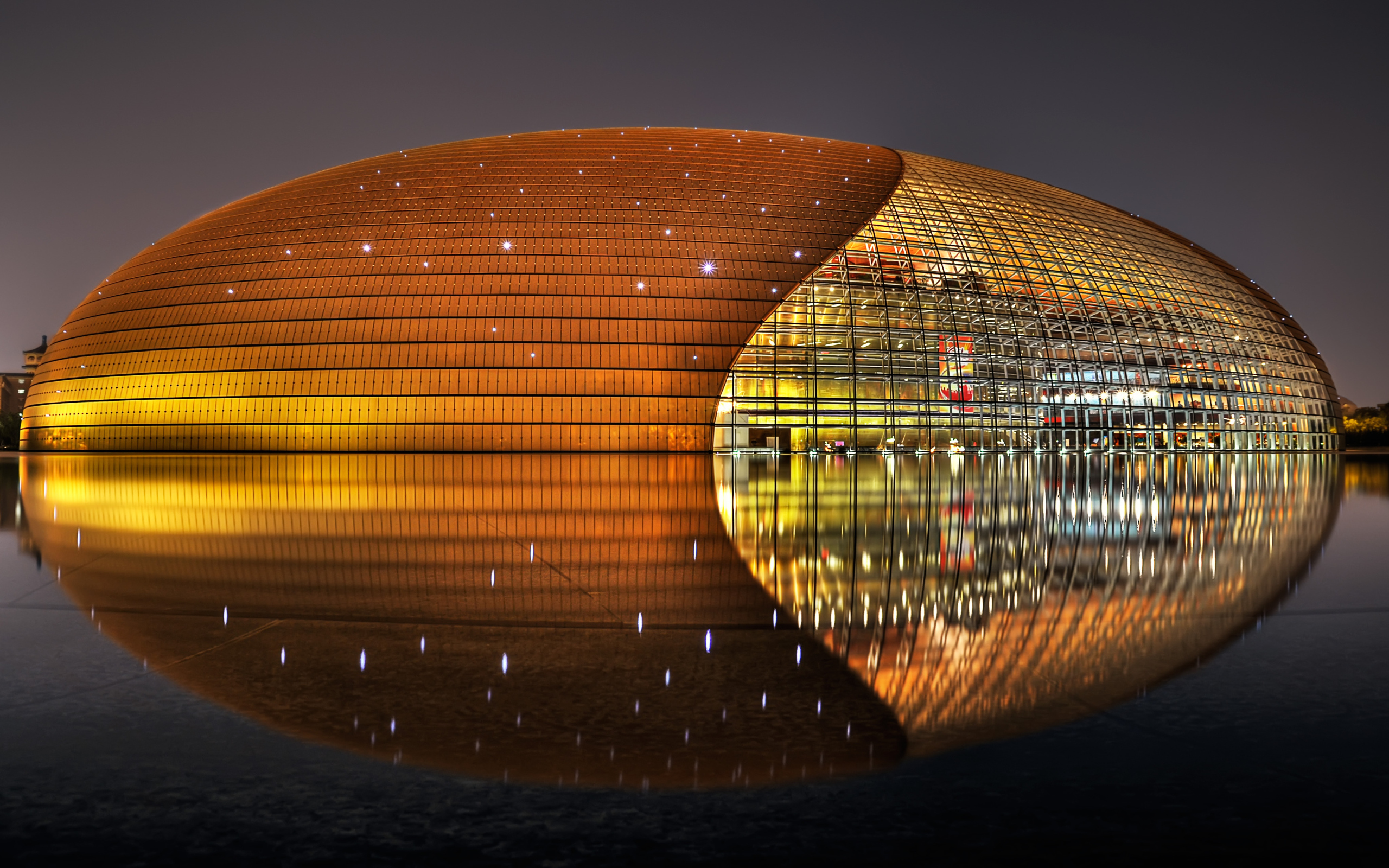 An unusual beautiful building is the National Center for the Arts. Beijing, China
