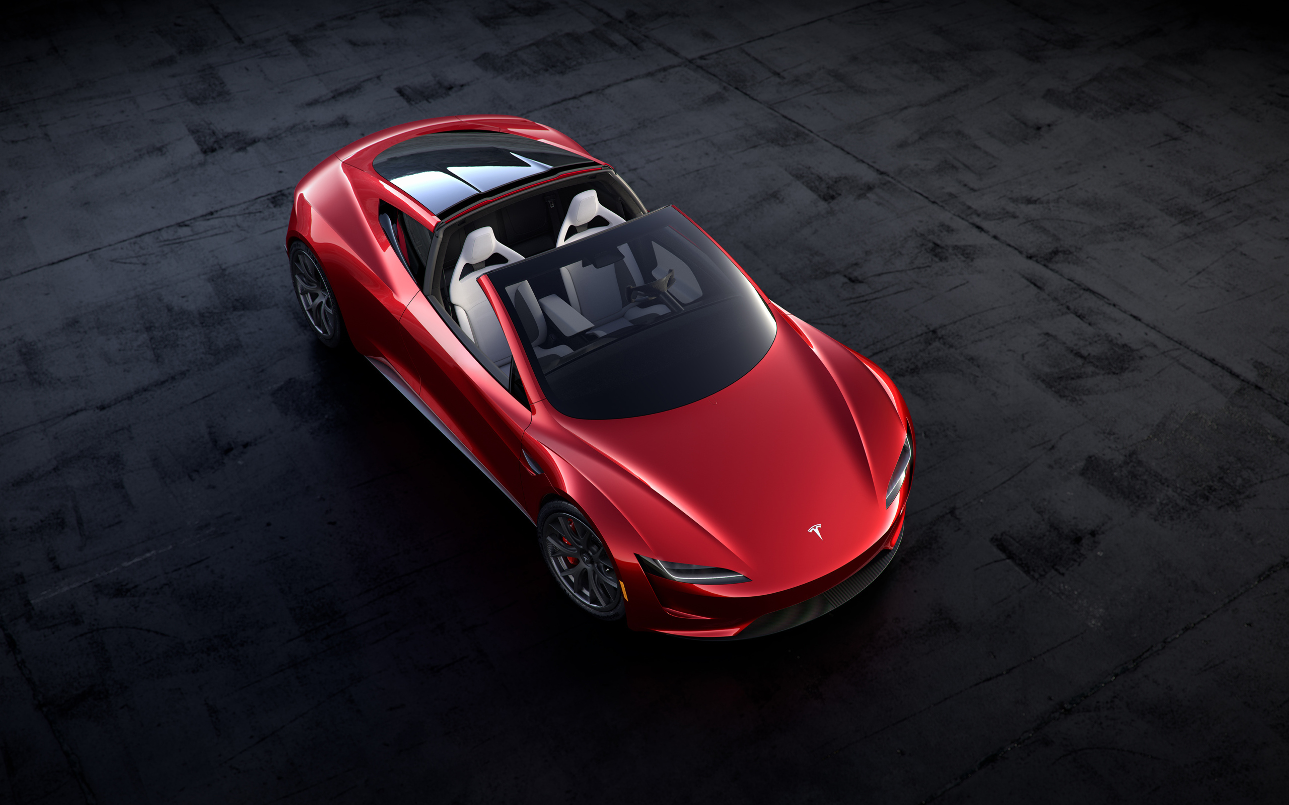 Красный автомобиль Tesla Roadster, 2020 вид сверху