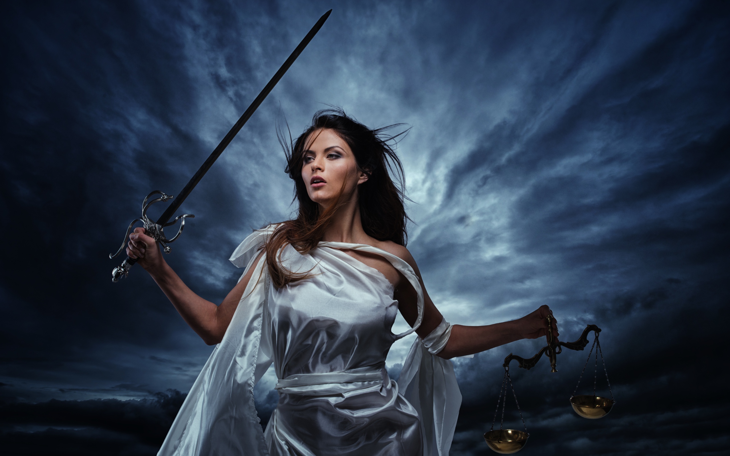 Girl with a sword and weights in the hands against the backdrop of a stormy sky, fantasy