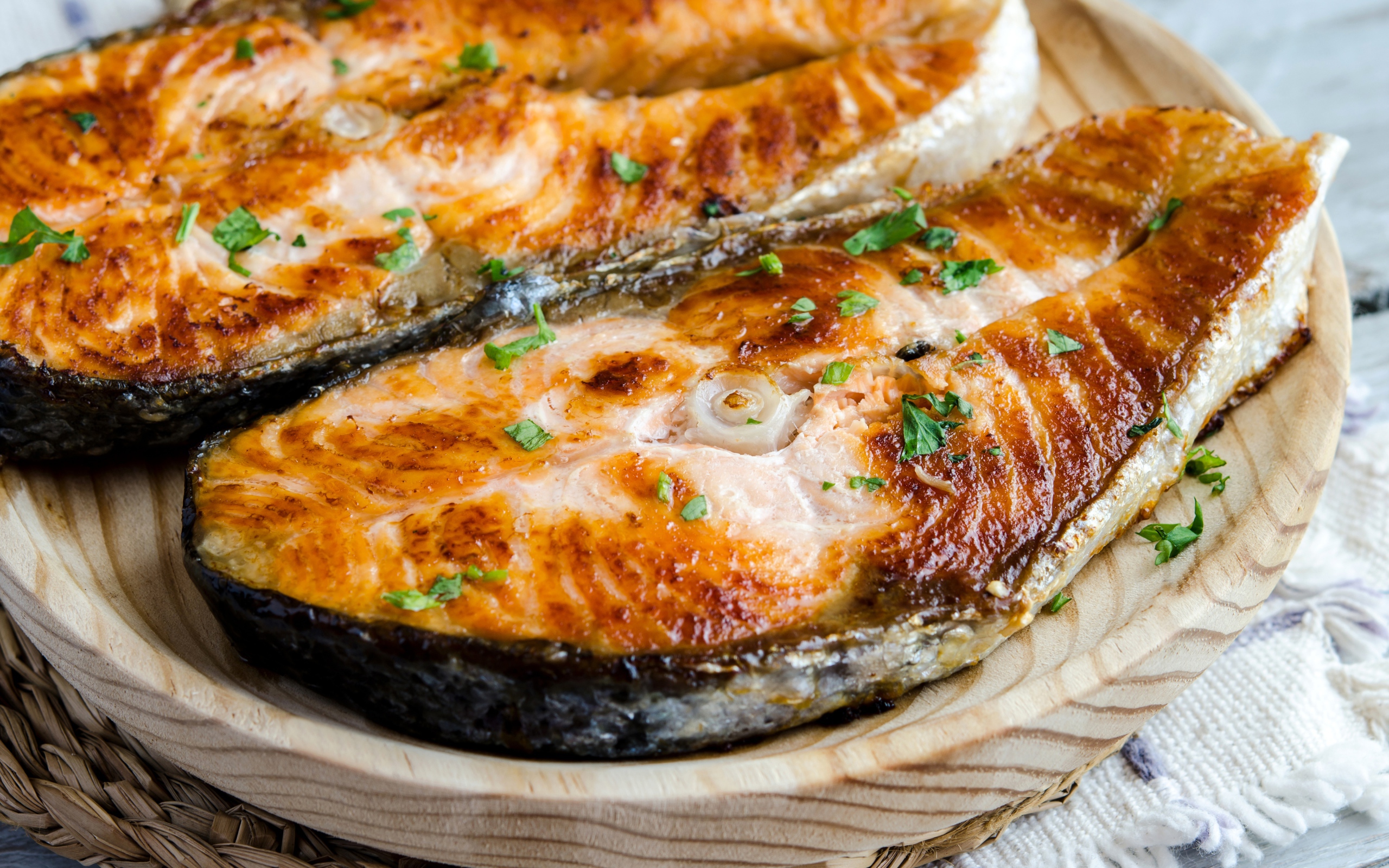 Appetizing pieces of fried fish on the table