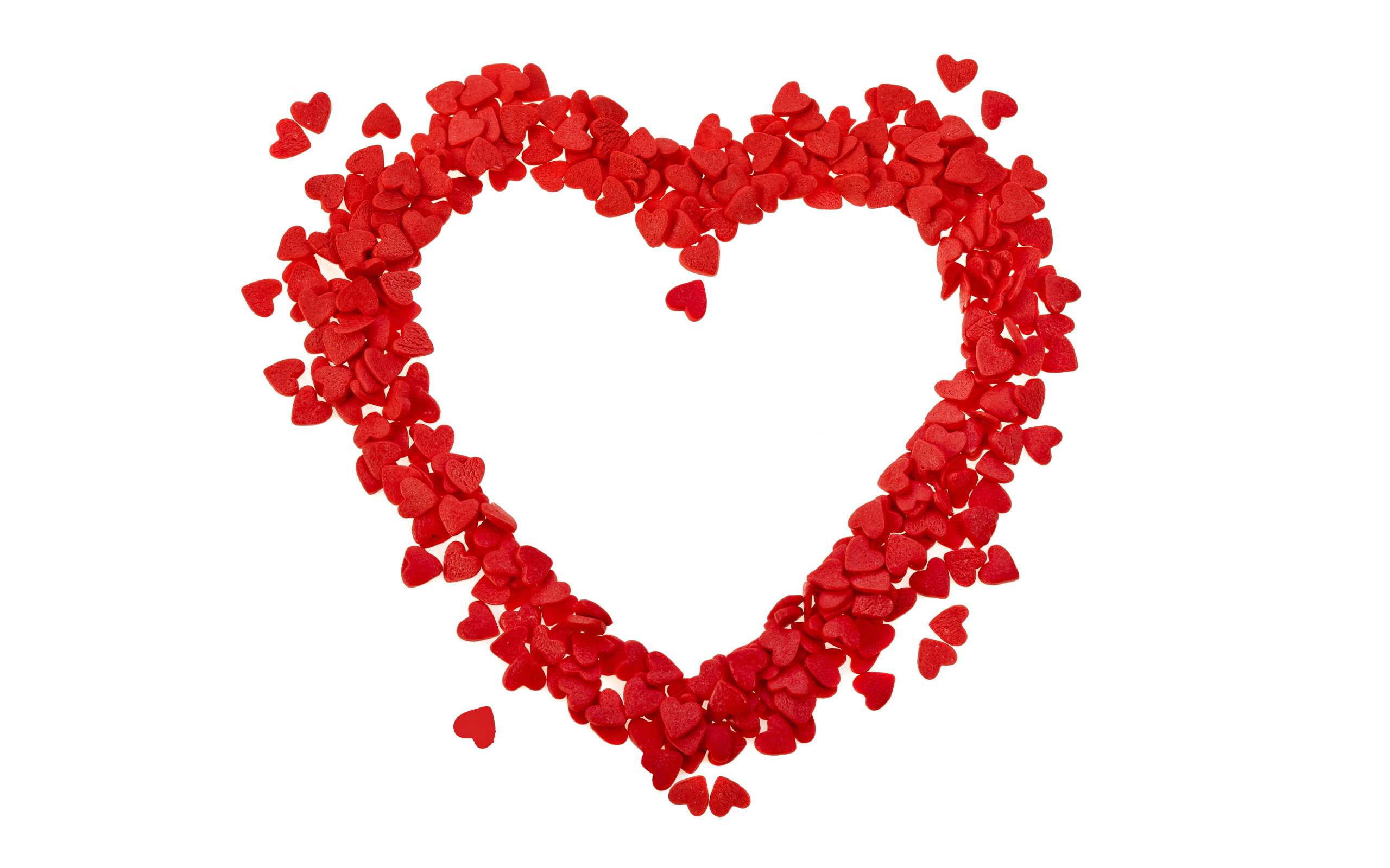 Heart of small red hearts on a white background.