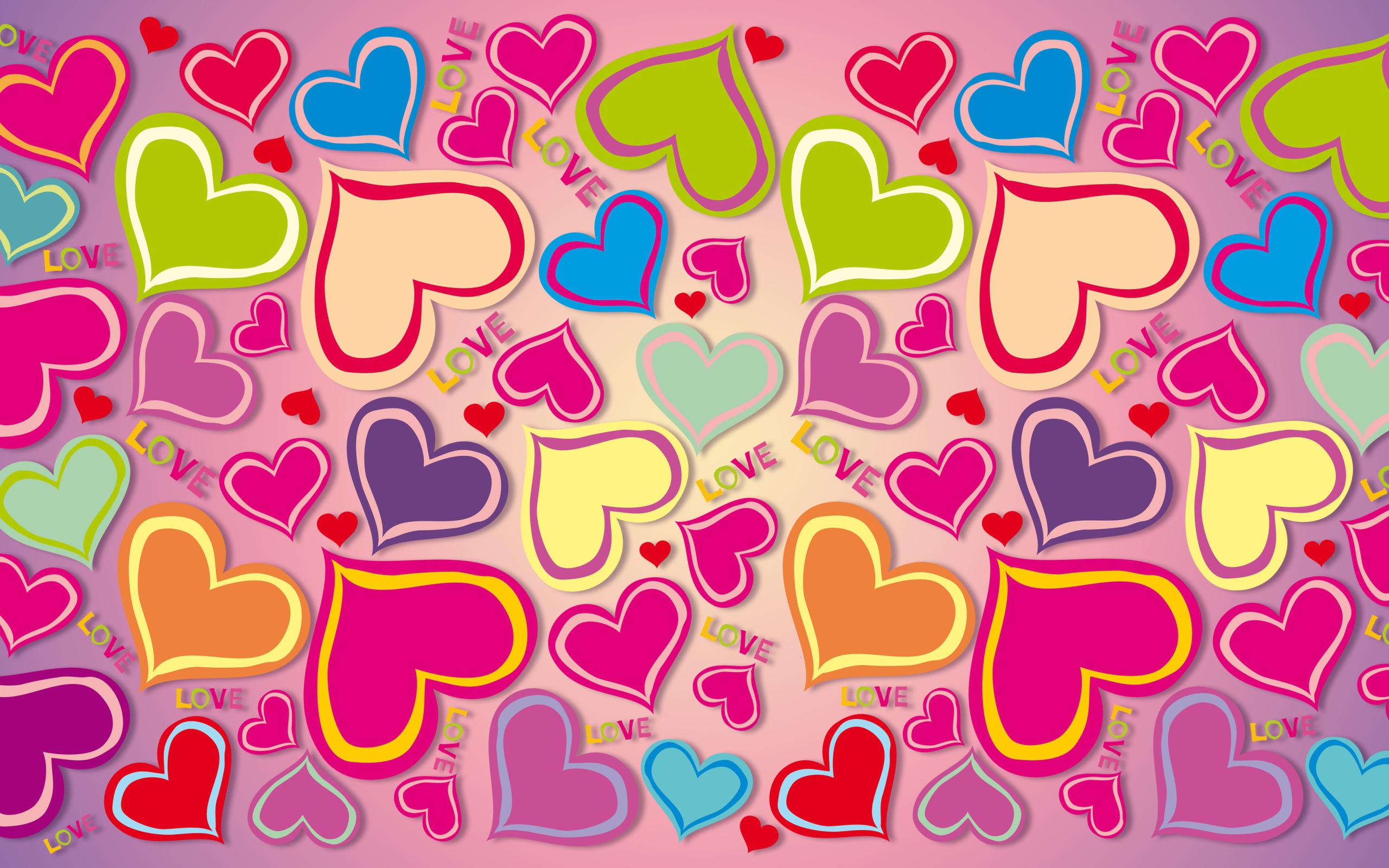 Много разноцветных сердечек на розовом фоне