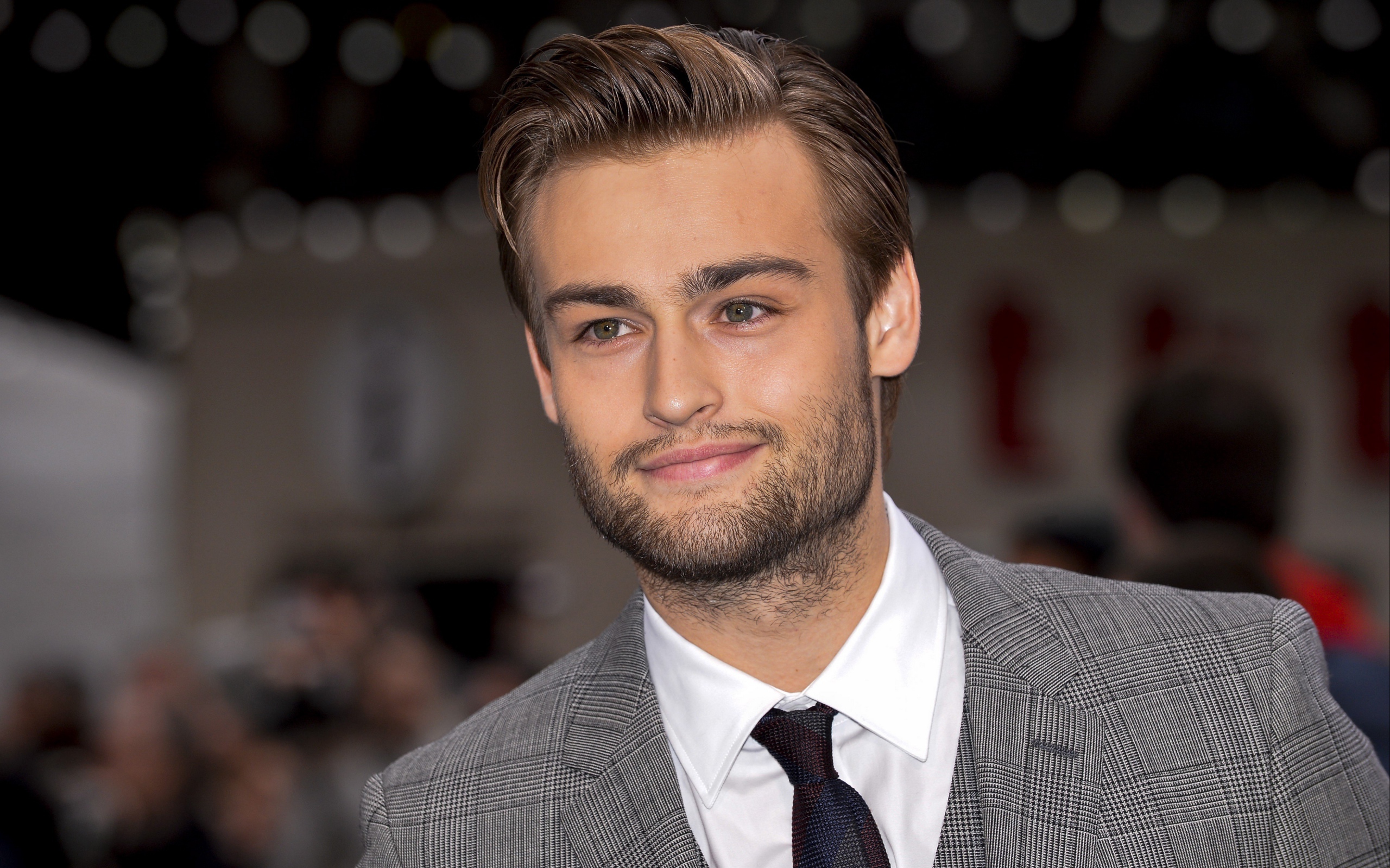 Handsome stylish actor Douglas Booth in costume