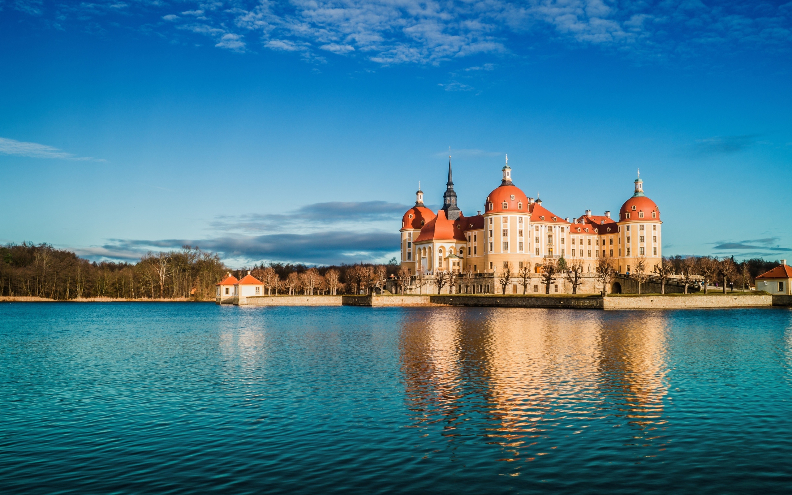 Moritzburg Castle by the Lake under the beautiful blue sky, Germany