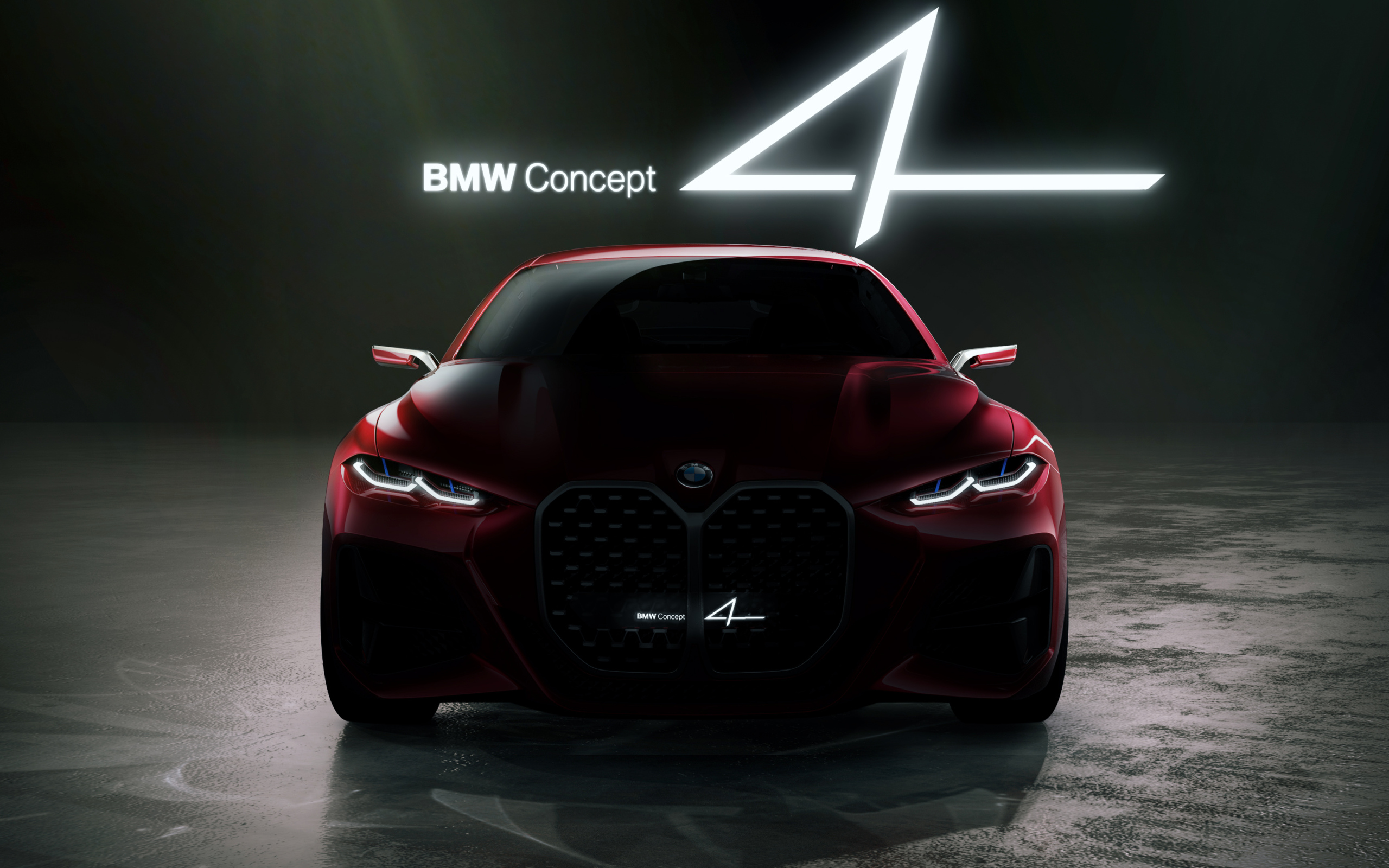 Красный автомобиль BMW Concept 4 2019 года на черном фоне