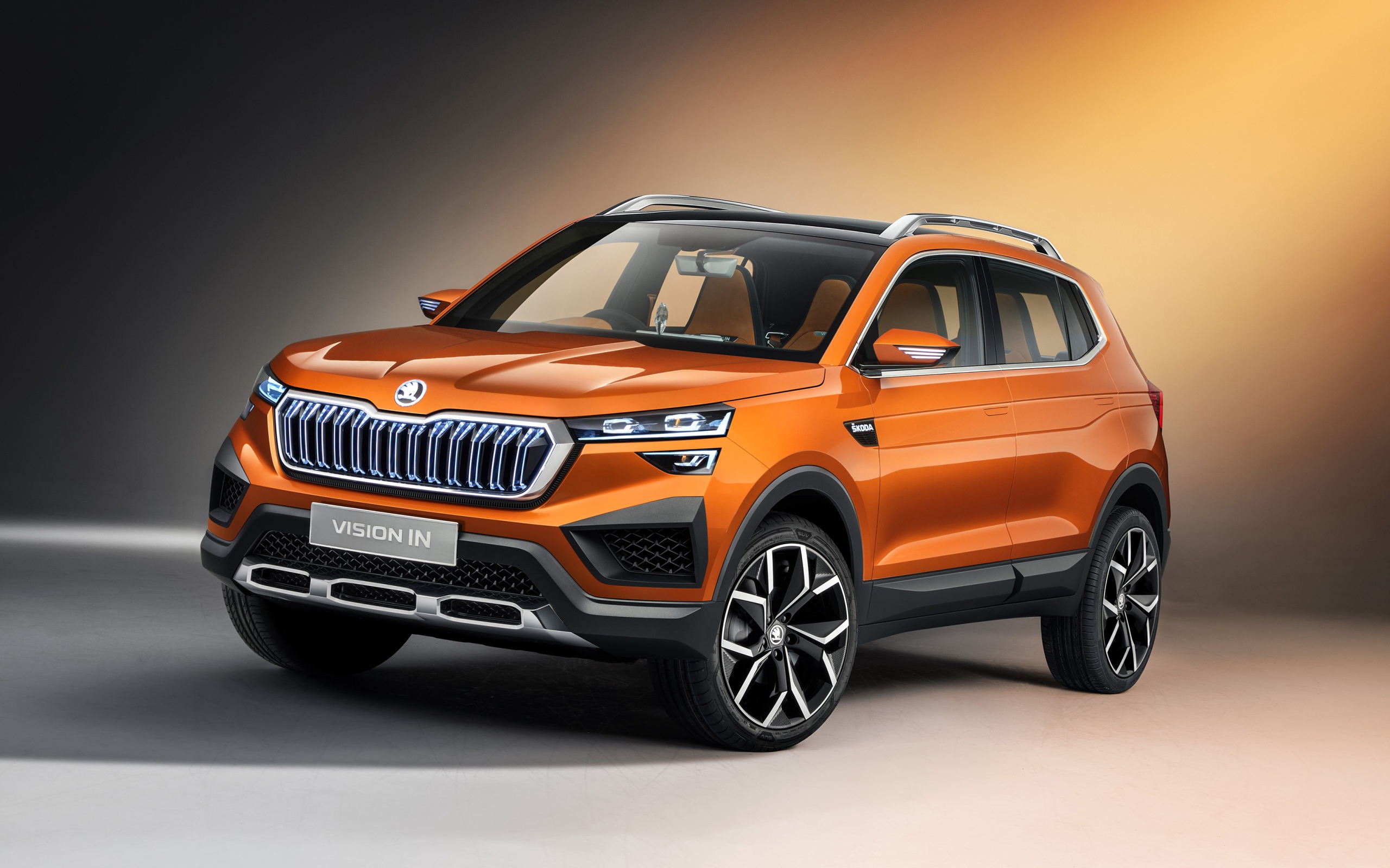 Оранжевый внедорожник Skoda Vision IN 2020 года