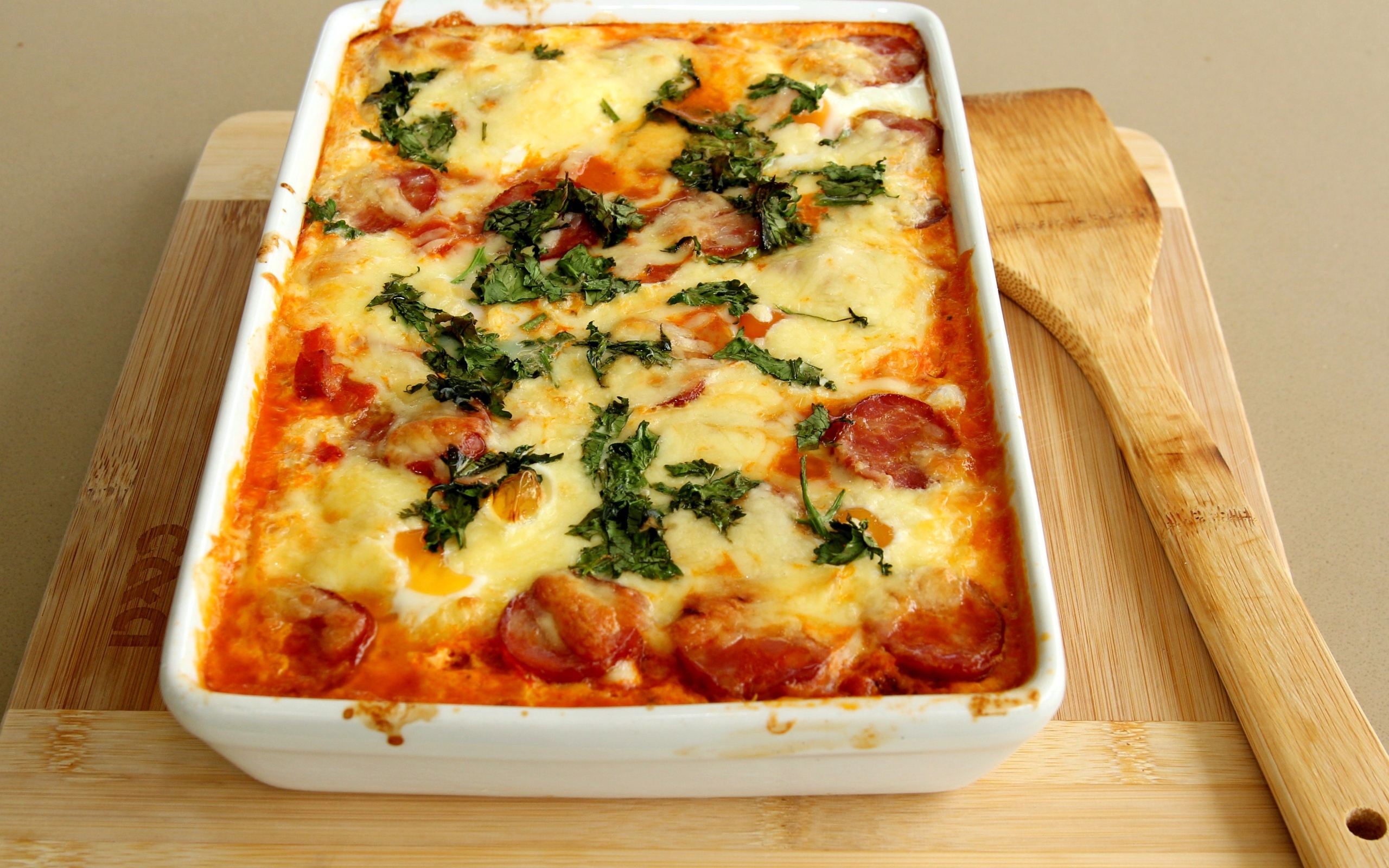 Casserole with sausage and cheese on the table