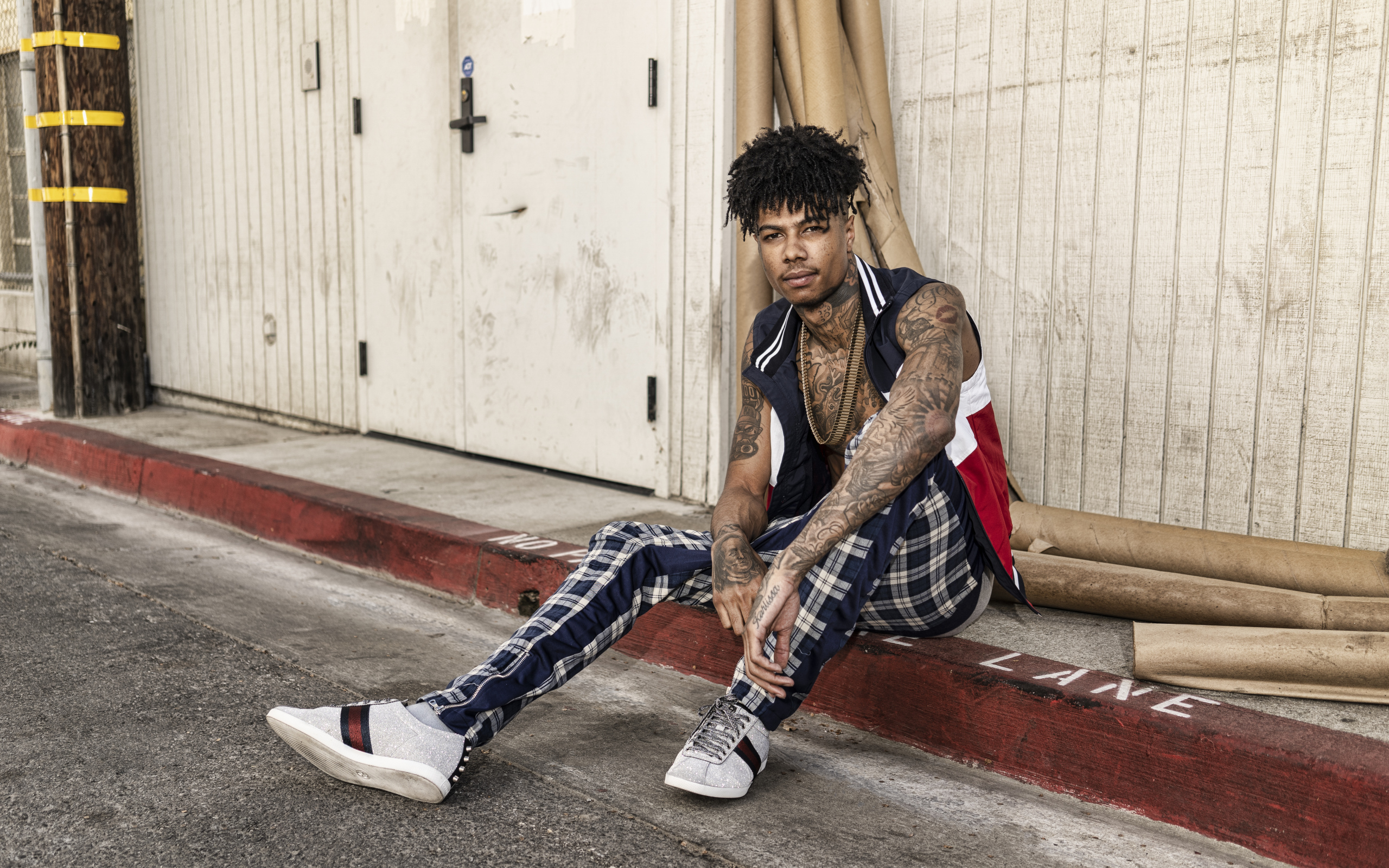 Американский рэпер Blueface  с татуировками на теле