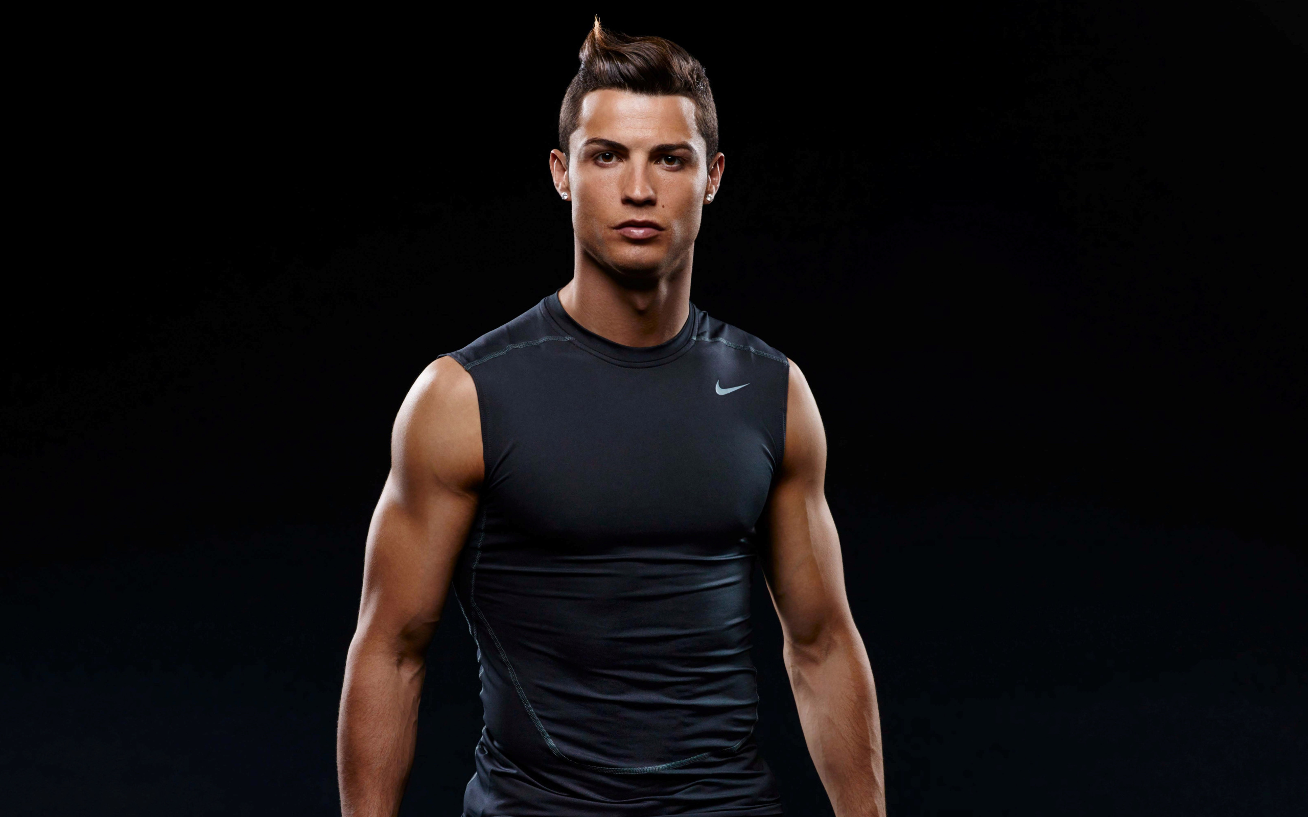 Juventus football player Cristiano Ronaldo on a black background