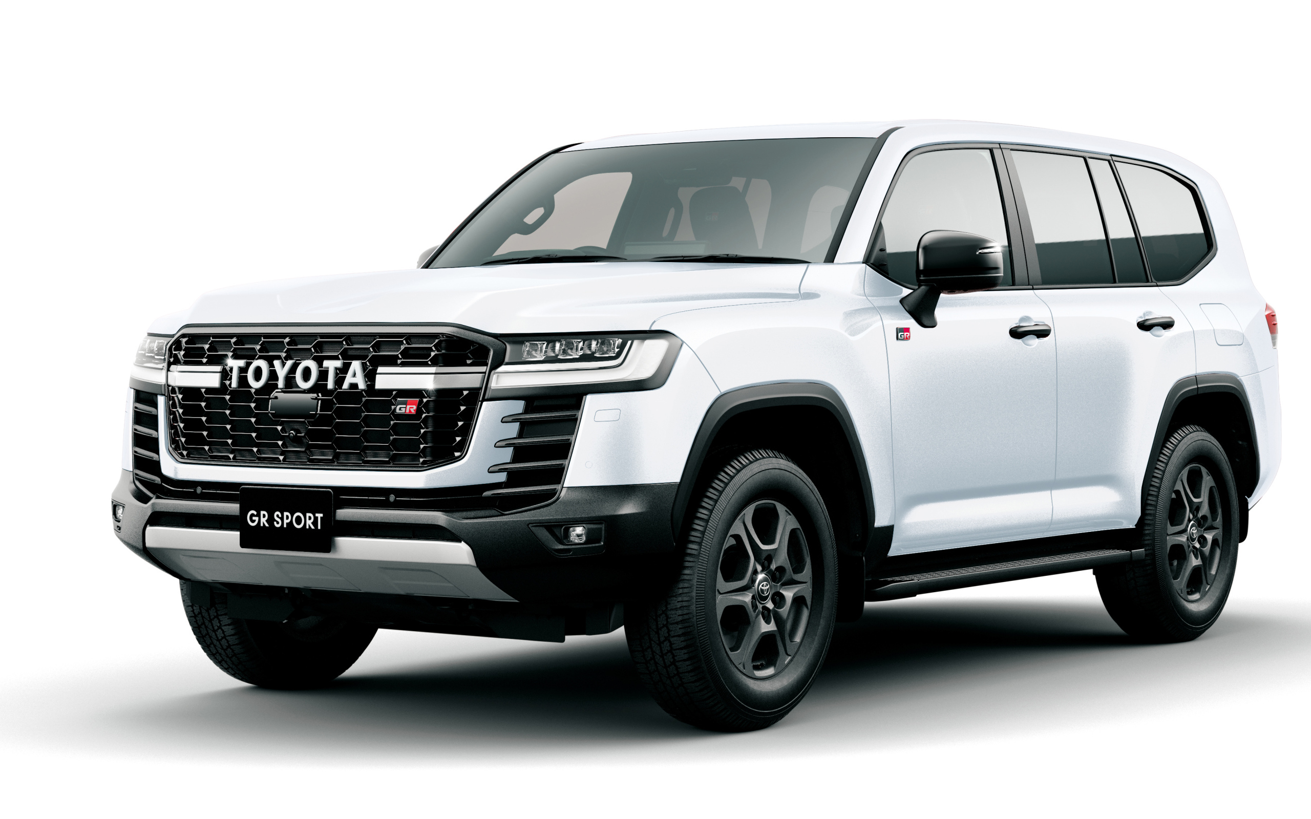 Большой автомобиль Toyota Land Cruiser GR Sport 2021 года на белом фоне 