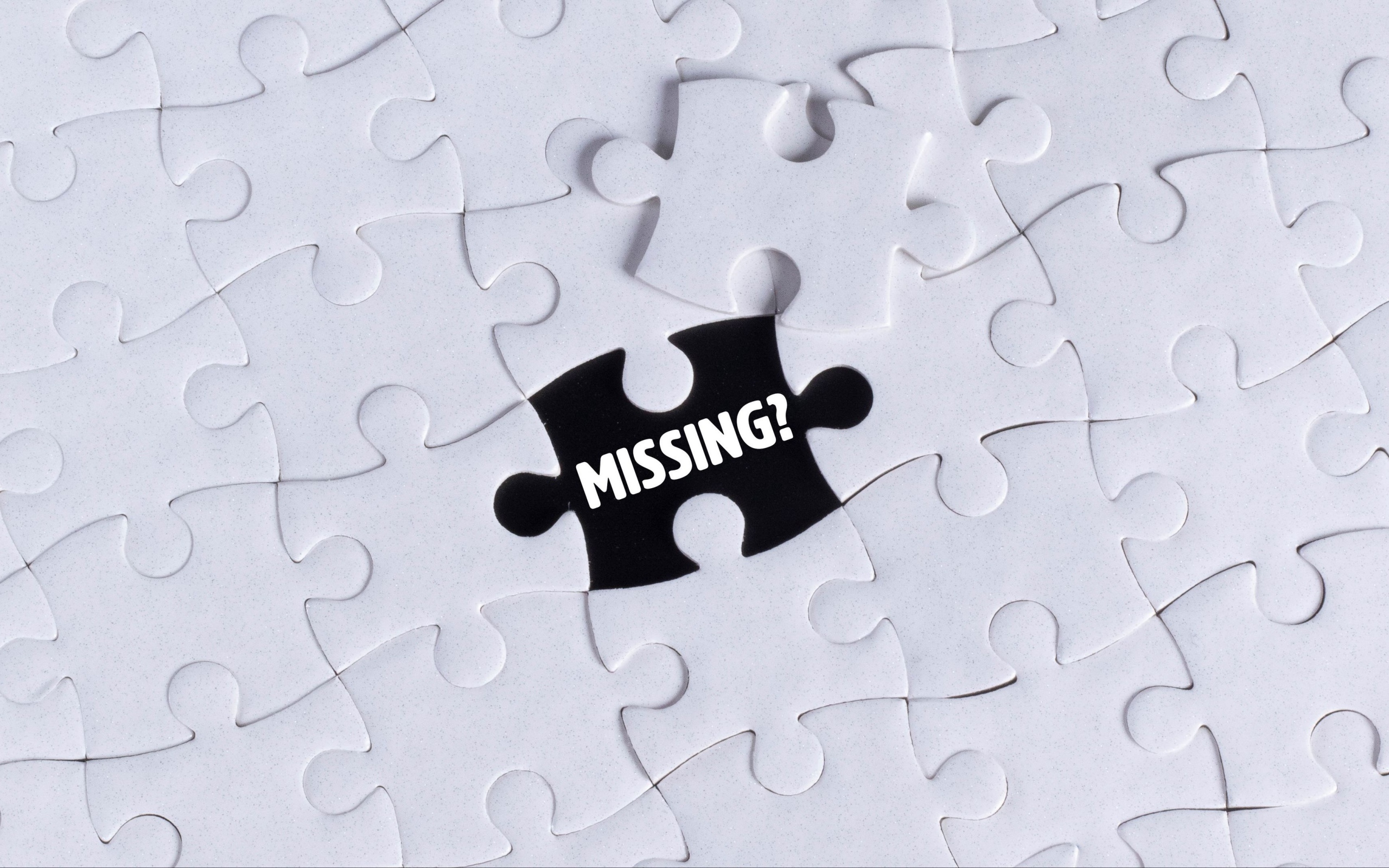 Черный пазл на белой картинке 