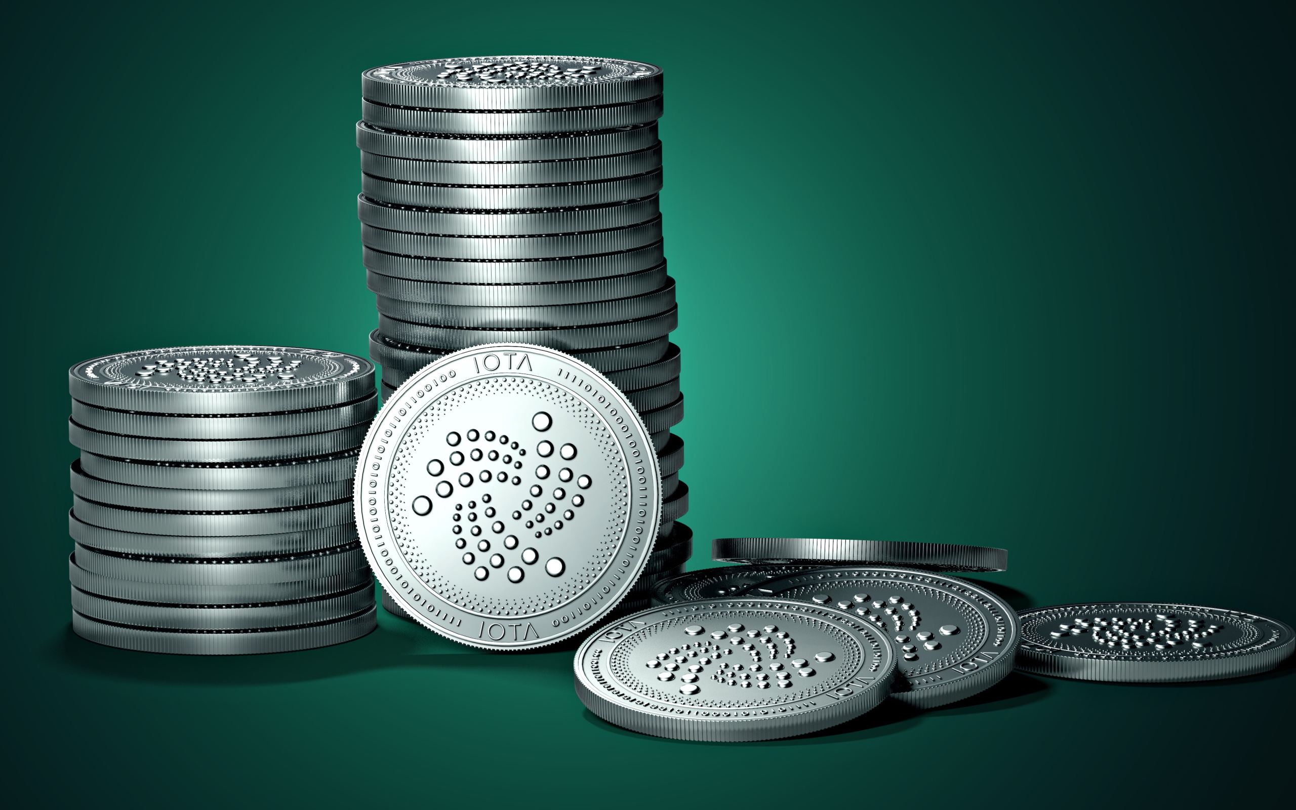 Монеты IOTA на зеленом фоне