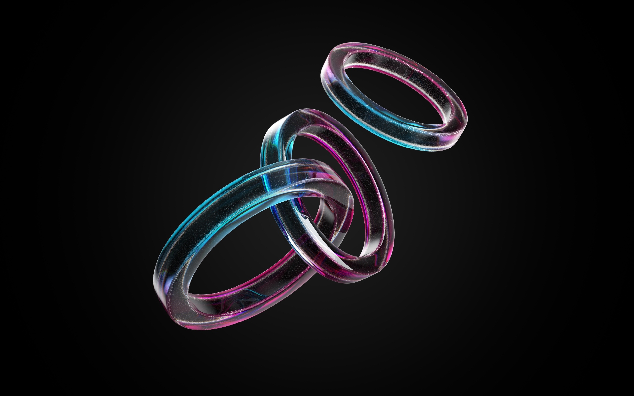 Стеклянные 3д кольца на черном фоне