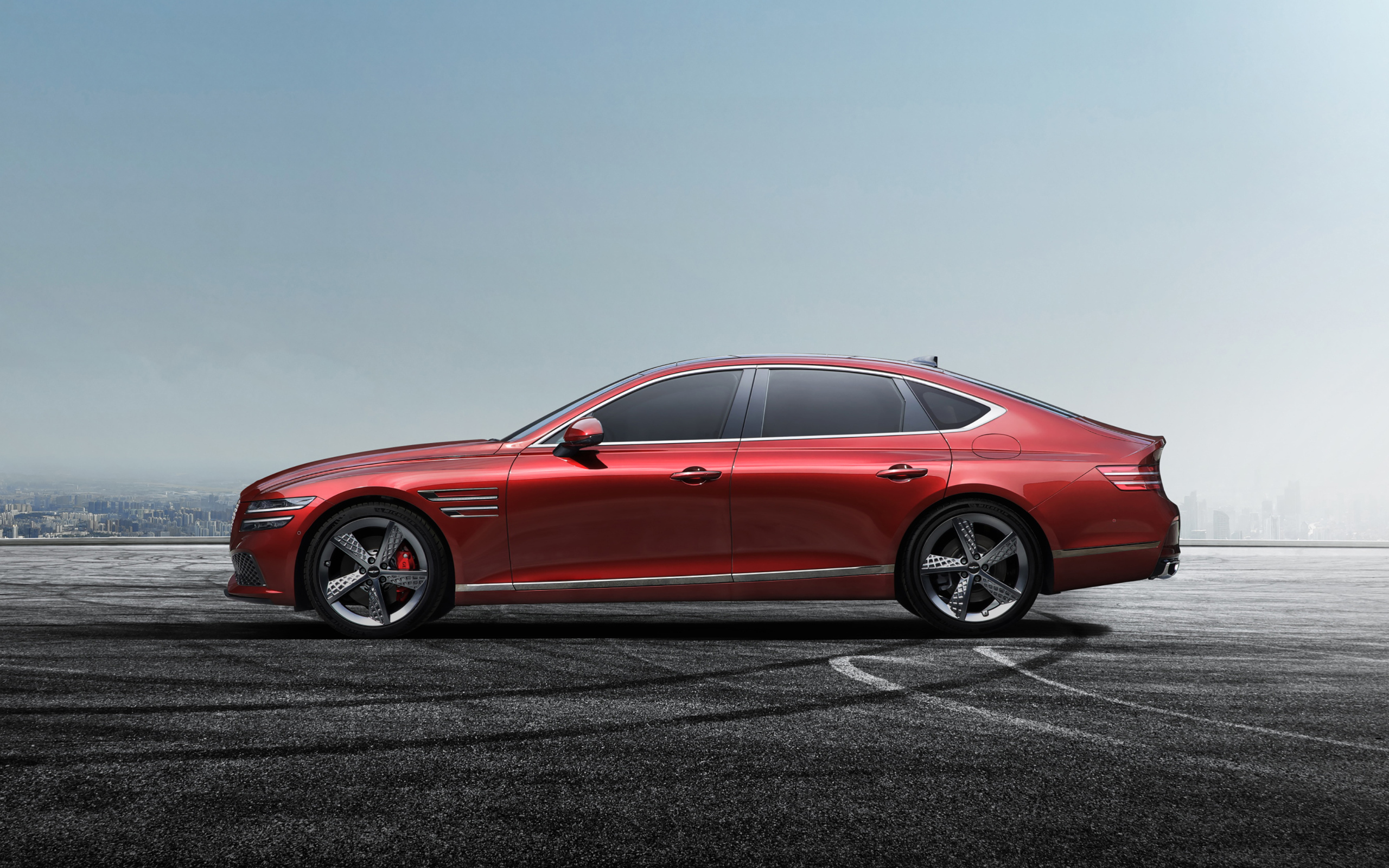 Автомобиль Genesis G80 Sport 2022 года вид сбоку