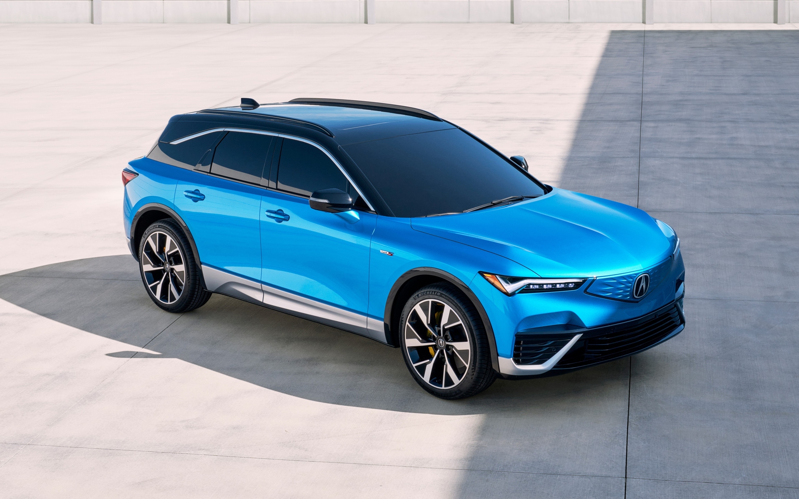 Голубой автомобиль Acura ZDX Type S 2024 года