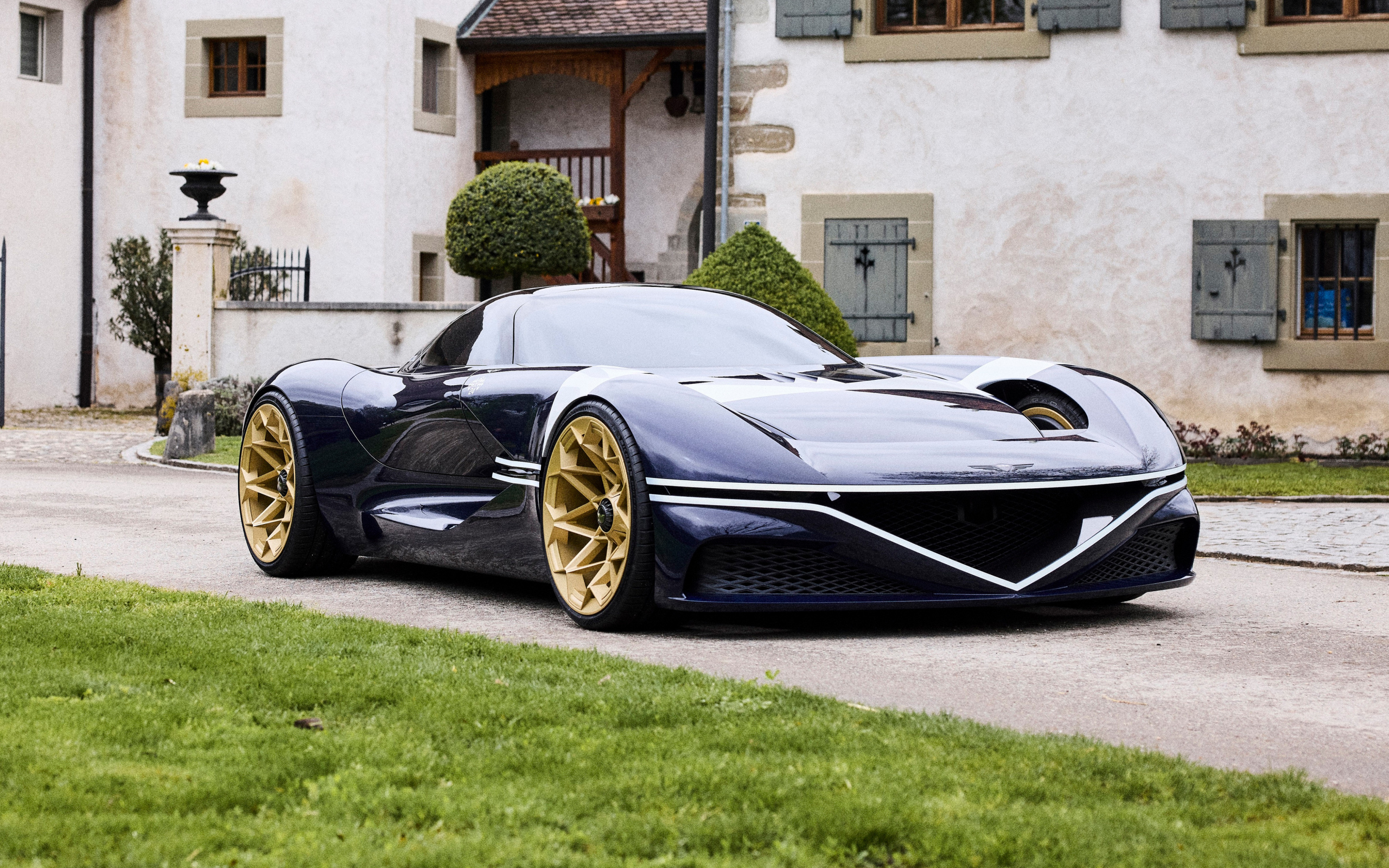 Черный автомобиль Genesis X Gran Berlinetta Tribute 2024  года