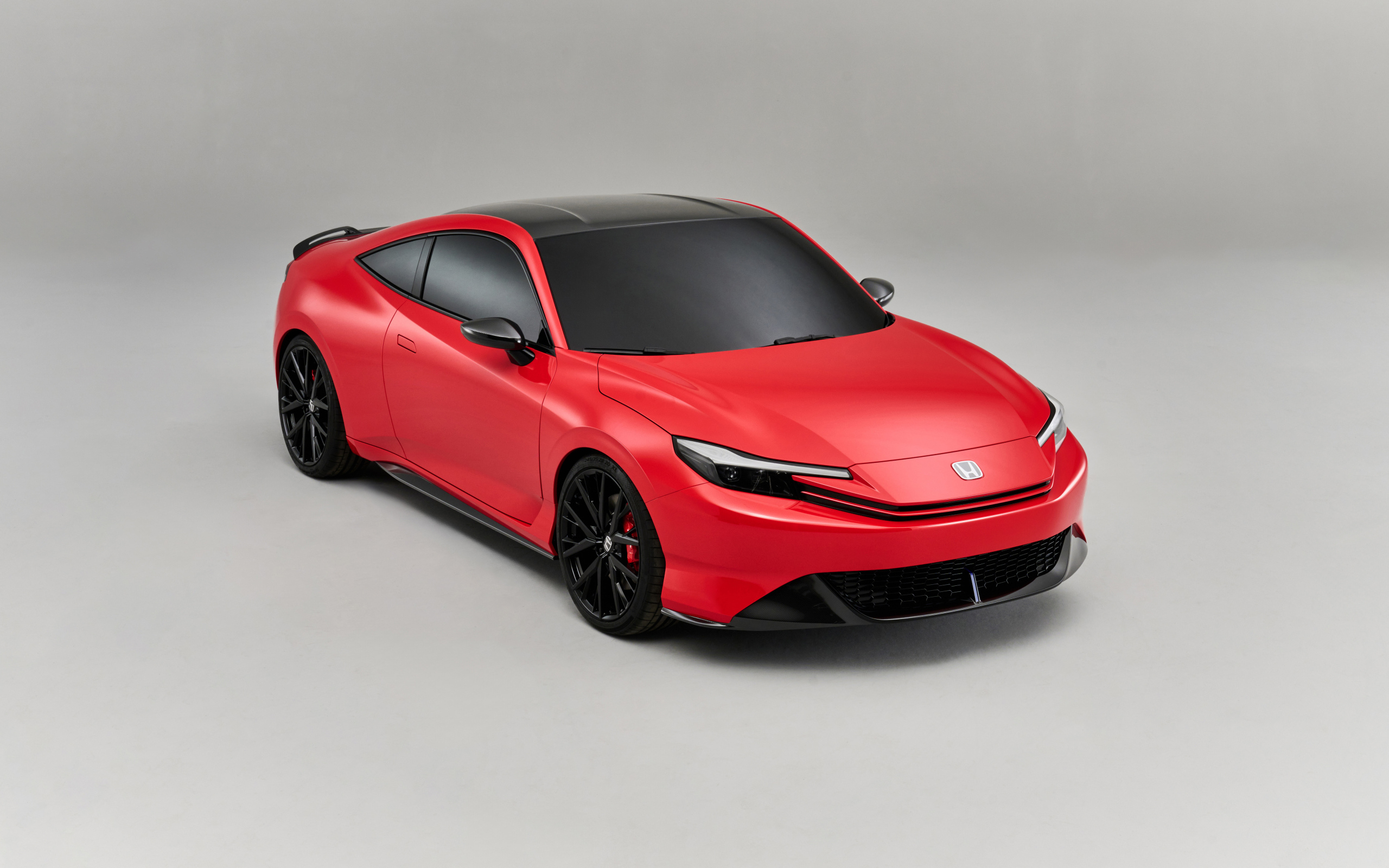Красный автомобиль Honda Prelude Concept 2024 года на сером фоне
