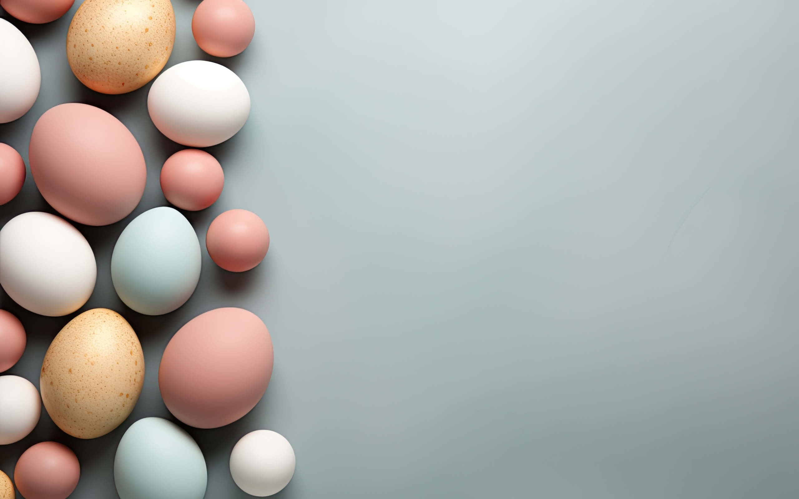 Много разноцветных яиц на сером фоне