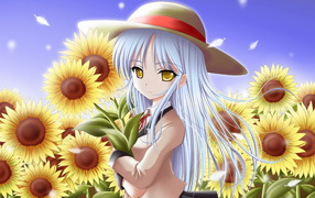 Девочка среди подсолнухов