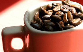 Mug with coffee beans