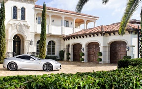 Ferrari near rich house