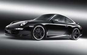 Черный Порше с черными литыми дисками