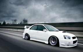 white Subaru Impreza STI