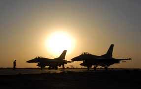 Military aircraft / fighter aircraft at sunset
