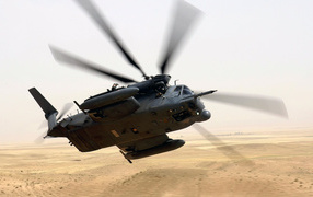 Military aircraft / helicopter over the desert
