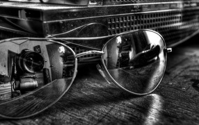 Объектив в отражении