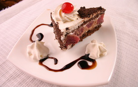 Piece of cake with cherries