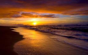 Sunset on the beach, a popular resort