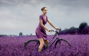In the field on a bicycle